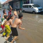 BPBD Mengeluarkan Larangan Bermain di Kawasan Banjir Rob untuk Mencegah Serangan Buaya