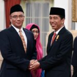 Jokowi Pecat Hasyim Asy'ari dari KPU Secara Tidak Hormat